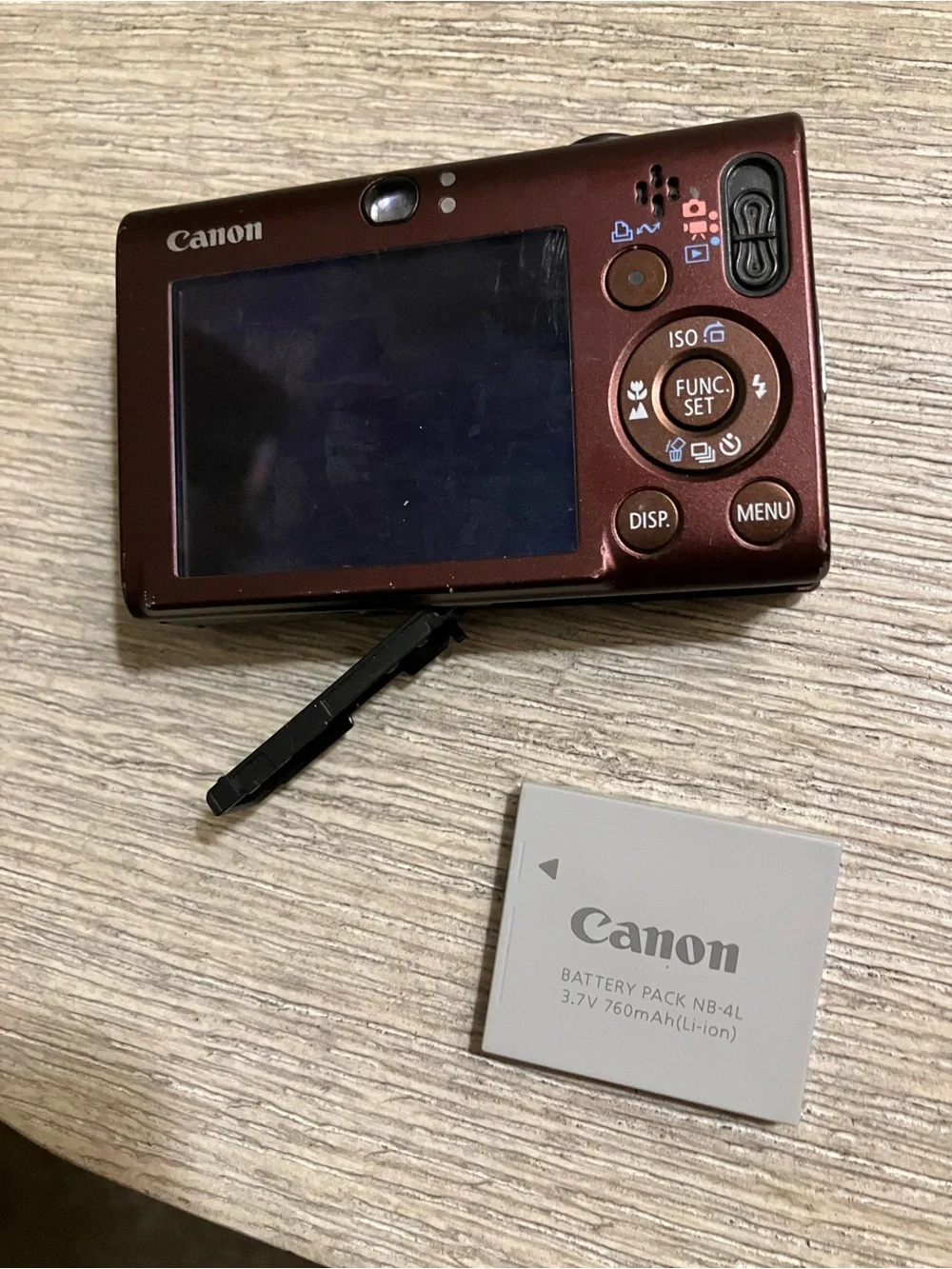 Canon PowerShot SD1100 IS Compact Red Camera with Navy Canon Battery Charger